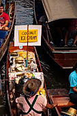 Thailand, Locals sell fruits, food and products at Damnoen Saduak floating market near Bangkok 